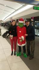 Daughter and dad with Grinch