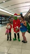 Grinch with his Who and two little kids